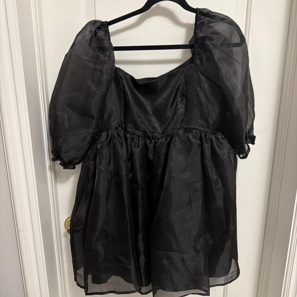Black sheer dress with puffy sleeves perfect for witchy vibes or little black dr